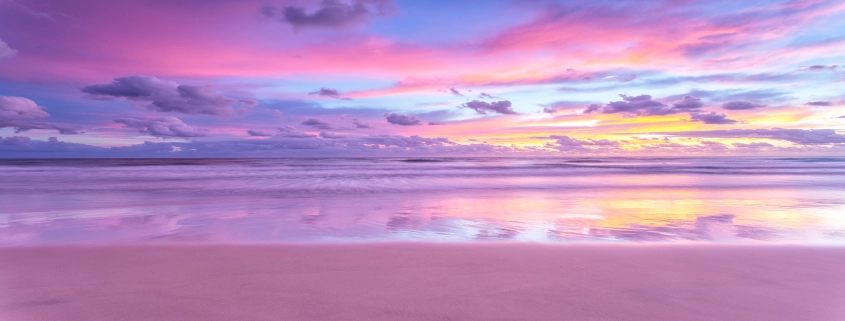 Beautiful Pink Sky with Clouds and Ocean
